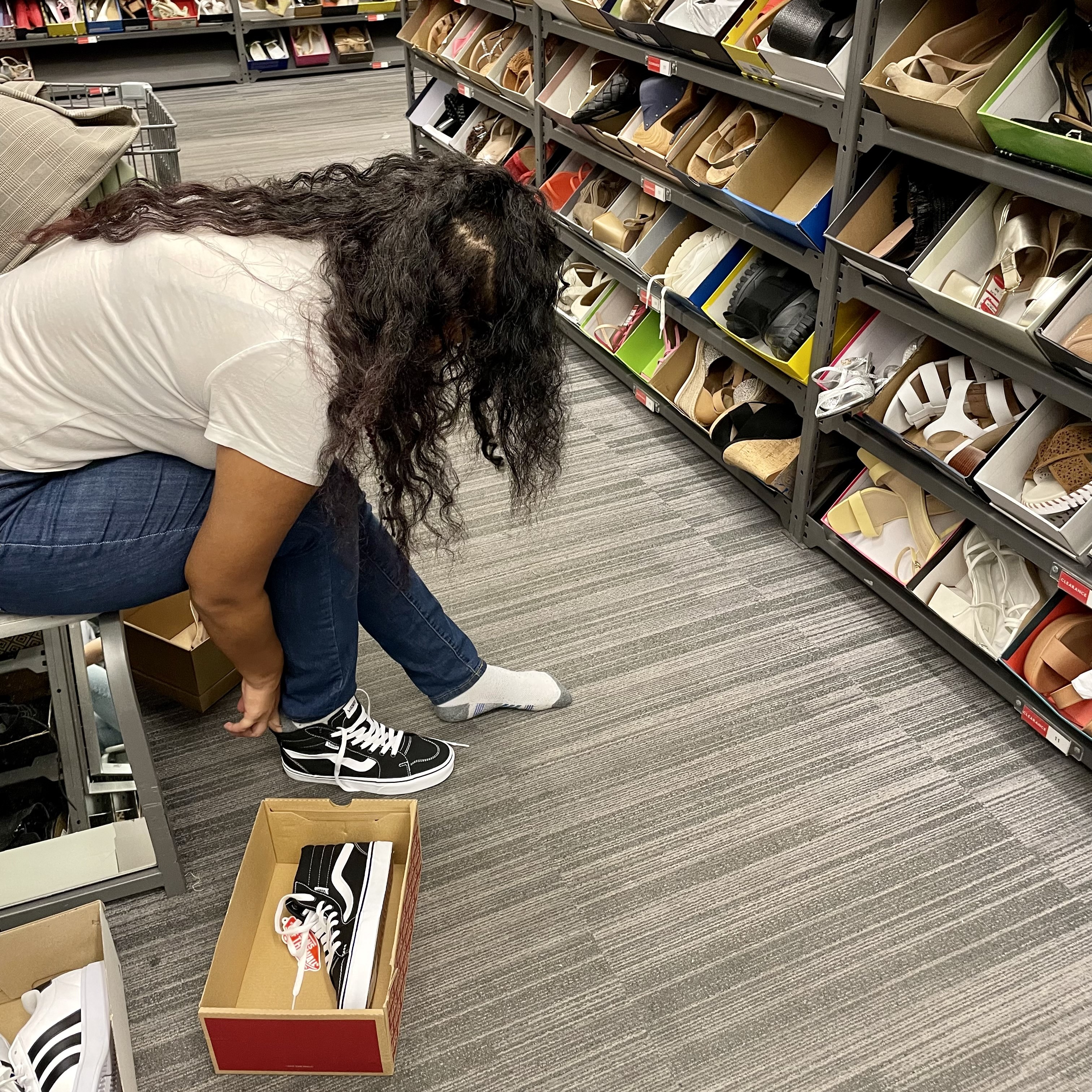 Teen trying on shoes