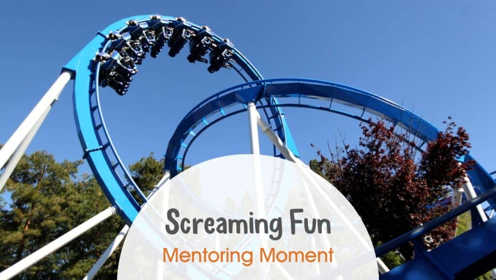 Looped roller coaster with riders upside down