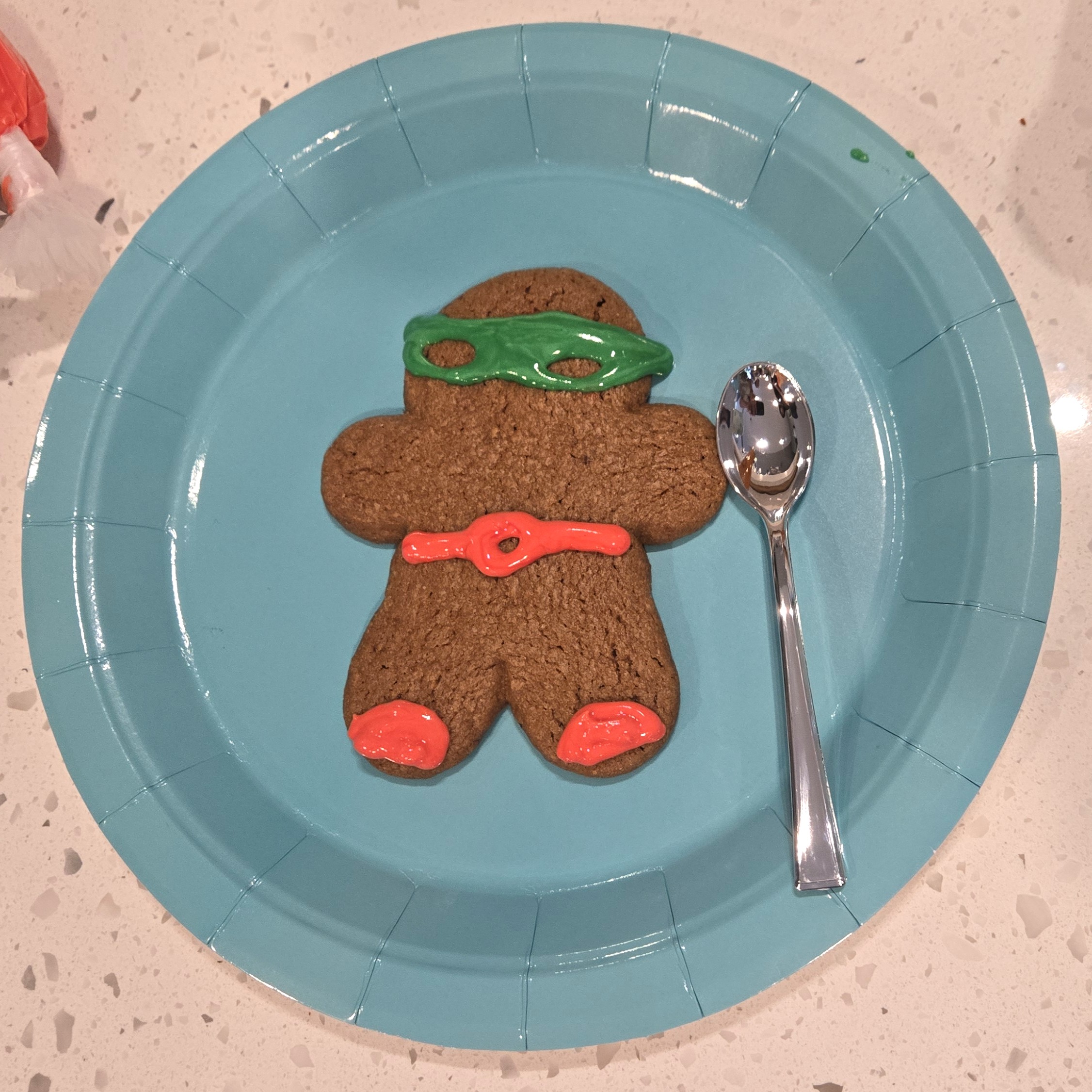 Gingerbread cookie decorated as a ninja