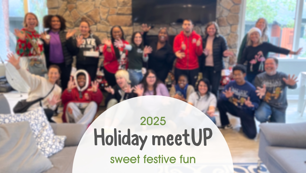 Blurred image of Holiday meetUP attendees
