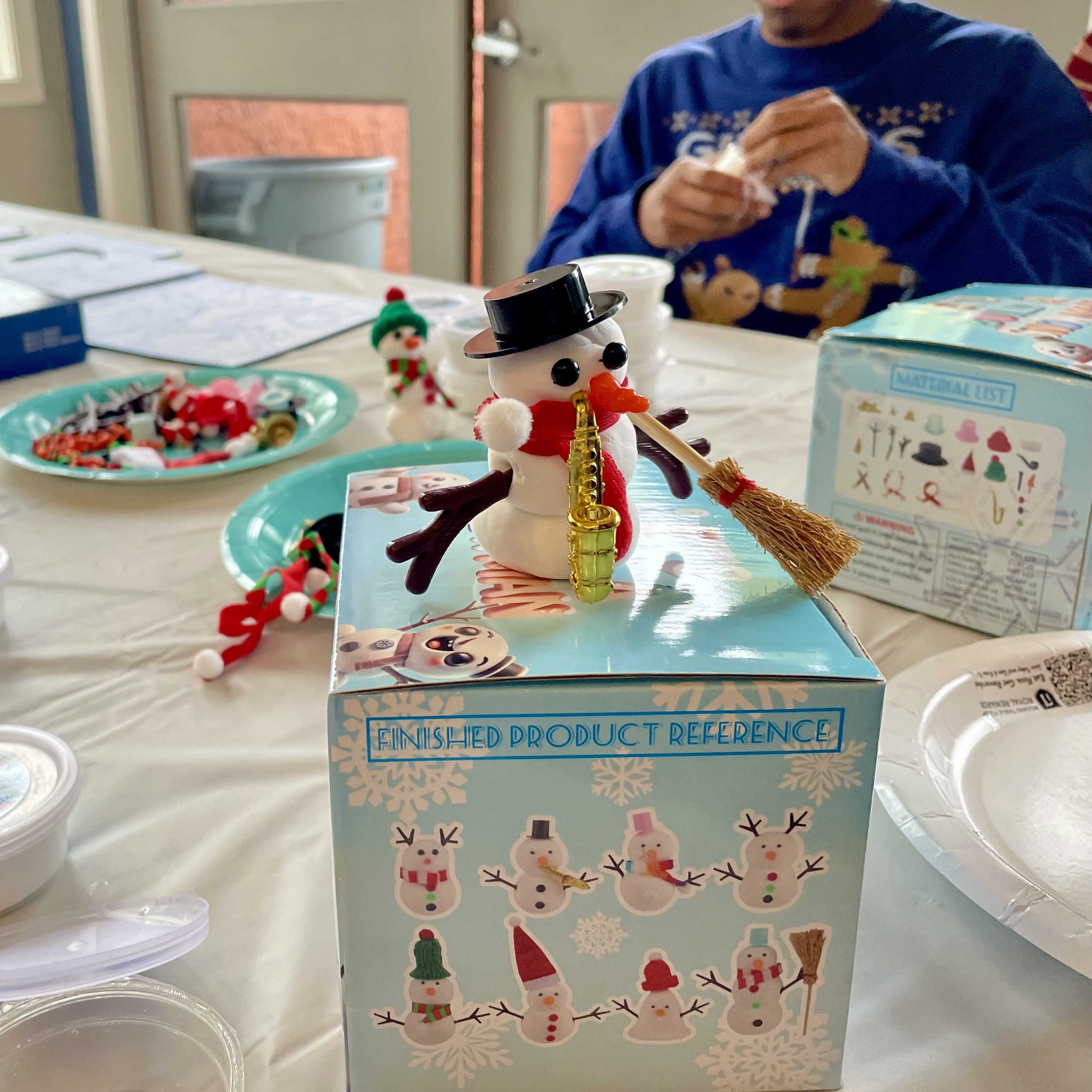 Air-dry clay snowman made by a mentee