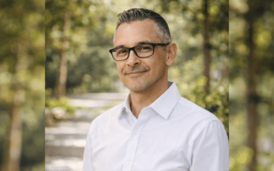 Member Martin in white collared shirt smiling